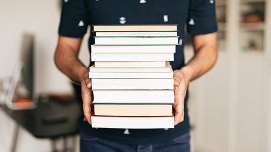 man with books